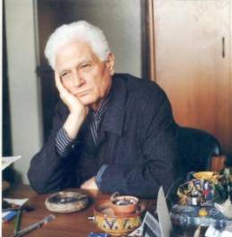 Derrida at his desk